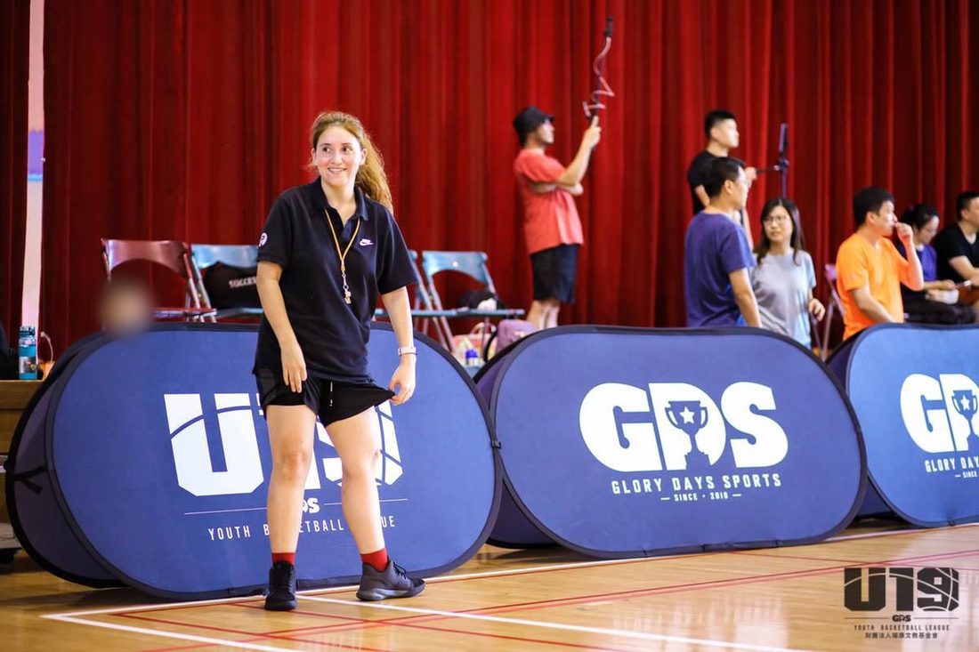 Paulina on court at a youth basketball league event